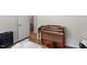 Living area featuring a vintage piano at 2 Capri Ter, Durham, NC 27703