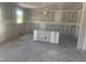 Unfinished two-car garage awaiting conversion with windows and smooth concrete flooring at 245 Tidal Pool Way, Cary, NC 27519