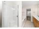 Bathroom with walk-in shower, soaking tub, double vanity, and tile flooring at 248 Inkster Cv, Raleigh, NC 27603