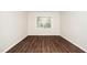 Bedroom with wood flooring and natural light at 248 Inkster Cv, Raleigh, NC 27603