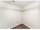 Walk-in closet with wire shelving and wood flooring at 248 Inkster Cv, Raleigh, NC 27603