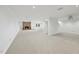 Basement features a fireplace, access to the backyard, and carpet floors at 2705 Vestry Way, Raleigh, NC 27613