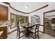 Charming breakfast nook with beautiful views of the wooded outdoor space at 2705 Vestry Way, Raleigh, NC 27613