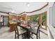 Eat-in kitchen with a square dining table surrounded by large windows at 2705 Vestry Way, Raleigh, NC 27613