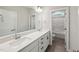 Bright bathroom featuring double vanity, quartz counters, and modern fixtures at 271 W Amber Oak Dr, Selma, NC 27576