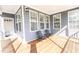 Charming porch offering a relaxing space with sleek chairs and ample sunlight at 2918 Heirloom Way, Apex, NC 27502