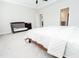 Large bedroom with white carpet, a crib, and door leading to bathroom for easy accessibility at 2918 Heirloom Way, Apex, NC 27502