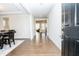 Welcoming entryway with hardwood floors and a view into the dining and living areas at 2918 Heirloom Way, Apex, NC 27502