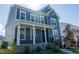 Charming two-story home with a covered front porch and well-maintained lawn at 2918 Heirloom Way, Apex, NC 27502