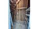 Basement with exposed brick foundation, wood framing and wire rack shelving at 3110 Fieldstone Ln, Mebane, NC 27302