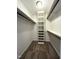 Walk-in closet with carpet flooring, built-in shelving, and ample storage space at 3110 Fieldstone Ln, Mebane, NC 27302