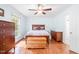 Bedroom featuring hardwood floors, a ceiling fan, and natural lighting at 318 Fieldstone Dr, Burlington, NC 27215