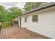 Inviting back deck, ideal for enjoying the outdoors with a view of the yard at 3620 Constellation Dr, Raleigh, NC 27604