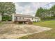 Spacious backyard with a deck and patio, perfect for outdoor entertaining at 3620 Constellation Dr, Raleigh, NC 27604