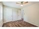 Bedroom featuring hardwood floors, closet, and two entryways at 3620 Constellation Dr, Raleigh, NC 27604