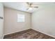 Bedroom featuring hardwood floors, neutral walls, and window at 3620 Constellation Dr, Raleigh, NC 27604
