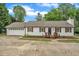 Charming single-story home with a well-maintained front yard and attached garage at 3620 Constellation Dr, Raleigh, NC 27604