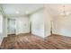 Open living area with hardwood floors, neutral paint, and lots of natural light at 3620 Constellation Dr, Raleigh, NC 27604