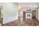 Cozy living area features a fireplace and hardwood floors throughout at 3620 Constellation Dr, Raleigh, NC 27604