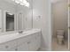 Bathroom with double vanity and white cabinets at 405 Commons Walk Cir, Cary, NC 27519