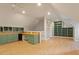 Spacious bonus room offering ample storage with custom built-ins and a versatile layout at 405 Commons Walk Cir, Cary, NC 27519