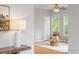 Cozy living room adjacent to seating area with natural lighting and stylish decor at 405 Commons Walk Cir, Cary, NC 27519