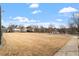 Picturesque park area with a gazebo and open field, offering a serene setting for outdoor activities at 405 Commons Walk Cir, Cary, NC 27519