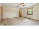 Bedroom with ceiling fan and a view of the outdoors at 462 Sullivan Rd, Selma, NC 27576