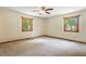 Bedroom with ceiling fan and natural light from windows at 462 Sullivan Rd, Selma, NC 27576