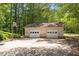 Detached two-car garage offering ample storage and parking space at 462 Sullivan Rd, Selma, NC 27576