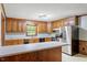 Traditional kitchen with stainless steel appliances and wood cabinets at 462 Sullivan Rd, Selma, NC 27576
