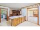 Kitchen featuring breakfast bar with view of living area at 462 Sullivan Rd, Selma, NC 27576