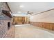Living room with brick fireplace and custom built-ins at 462 Sullivan Rd, Selma, NC 27576