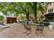 Community courtyard with lush landscaping, brick pavers, and outdoor furniture, providing a relaxing gathering space at 500 N Duke St # 55-105, Durham, NC 27701
