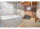 Laundry room area with modern washing machines and dryers, and bicycle storage at 500 N Duke St # 55-105, Durham, NC 27701