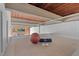 Loft featuring exposed ceiling, natural light, and fitness equipment for a modern, active lifestyle at 500 N Duke St # 55-105, Durham, NC 27701