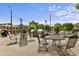 Community outdoor patio area with multiple tables and chairs for gatherings, plus community barbeque at 500 N Duke St # 55-105, Durham, NC 27701
