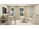 Cozy living room and breakfast nook with neutral tones and natural light at 544 Morning Light Dr, Angier, NC 27501