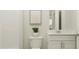 Clean and modern bathroom with vanity, toilet, and walk-in shower at 604 Vega Bluff Ln, Angier, NC 27501