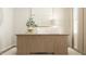 Bright home office featuring a wooden desk, modern decor, and natural lighting at 604 Vega Bluff Ln, Angier, NC 27501