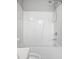Clean white bathtub and shower combination with chrome fixtures at 6927 Beaverwood Dr Dr, Raleigh, NC 27616