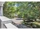 Charming neighborhood street view with mature trees, sidewalks and well-maintained landscaping at 700 Bishops Park Dr # 302, Raleigh, NC 27605