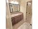 Bathroom features a granite countertop, stylish fixtures, and ample storage in the vanity at 7483 Danford Rd, Burlington, NC 27215