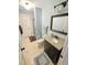 Bathroom featuring a granite vanity, framed mirror, and glass shower at 7483 Danford Rd, Burlington, NC 27215
