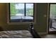 Bedroom with a view of the lake and access to the deck at 7483 Danford Rd, Burlington, NC 27215