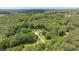 Aerial view of the property with mature trees at 8133 Holly Forest Rd, Wake Forest, NC 27587
