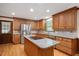 Updated kitchen with stainless steel appliances and granite countertops at 8133 Holly Forest Rd, Wake Forest, NC 27587