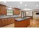 Beautiful kitchen with granite countertops and hardwood floors at 8133 Holly Forest Rd, Wake Forest, NC 27587