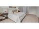 Comfortable bedroom with stylish decor and a cozy bed with bedside tables and soft lighting at 818 Comice Pear Way, Willow Springs, NC 27592