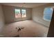 Bedroom with lots of windows providing ample natural light and a blank space for design at 829 Ottawa Dr, Garner, NC 27529